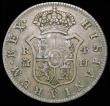 London Coins : A158 : Lot 2024 : Half Dollar George III Octagonal Countermark on a Spain 4 Reales 1776PJ Crowned M (Madrid) counterma...