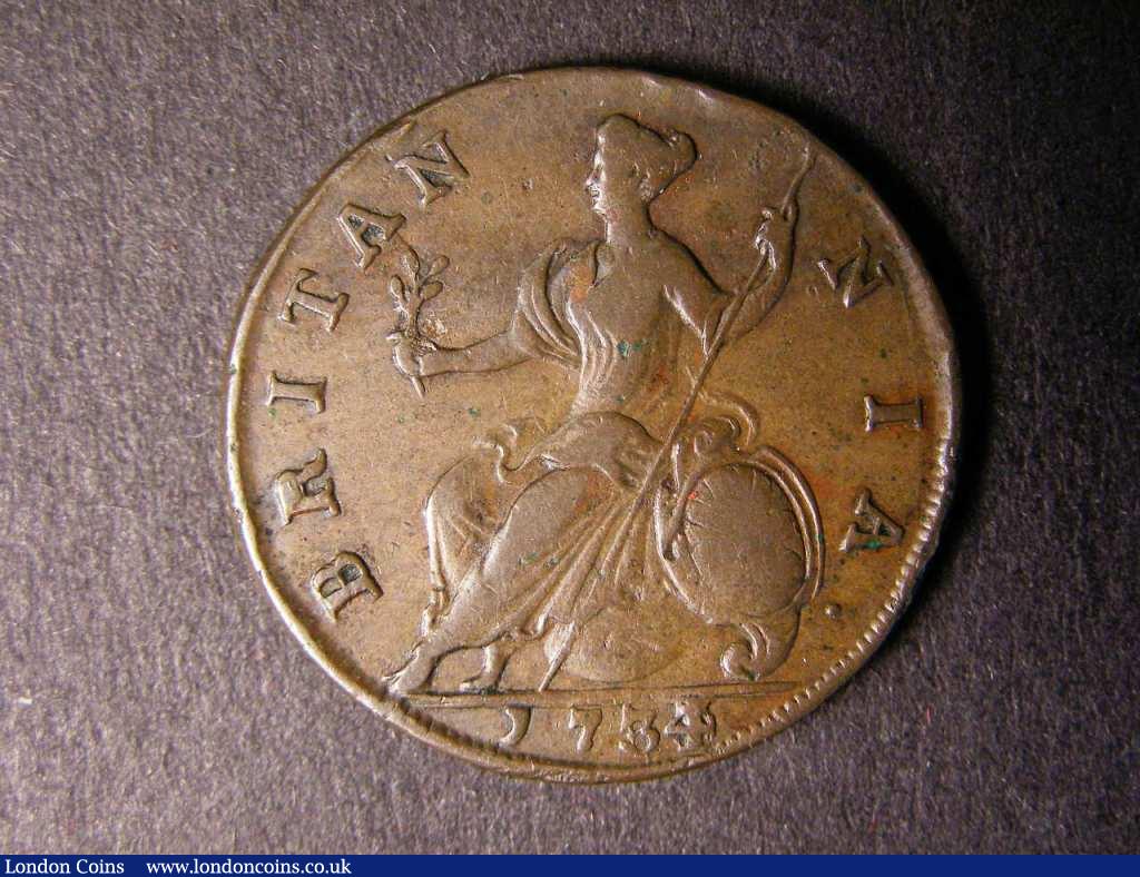 London Coins : A122 : Lot 1669 : Halfpenny 1734 4 over 3 Peck 846 Fine with a dig on the portrait, Ex-Nicholson collection 2003 i...