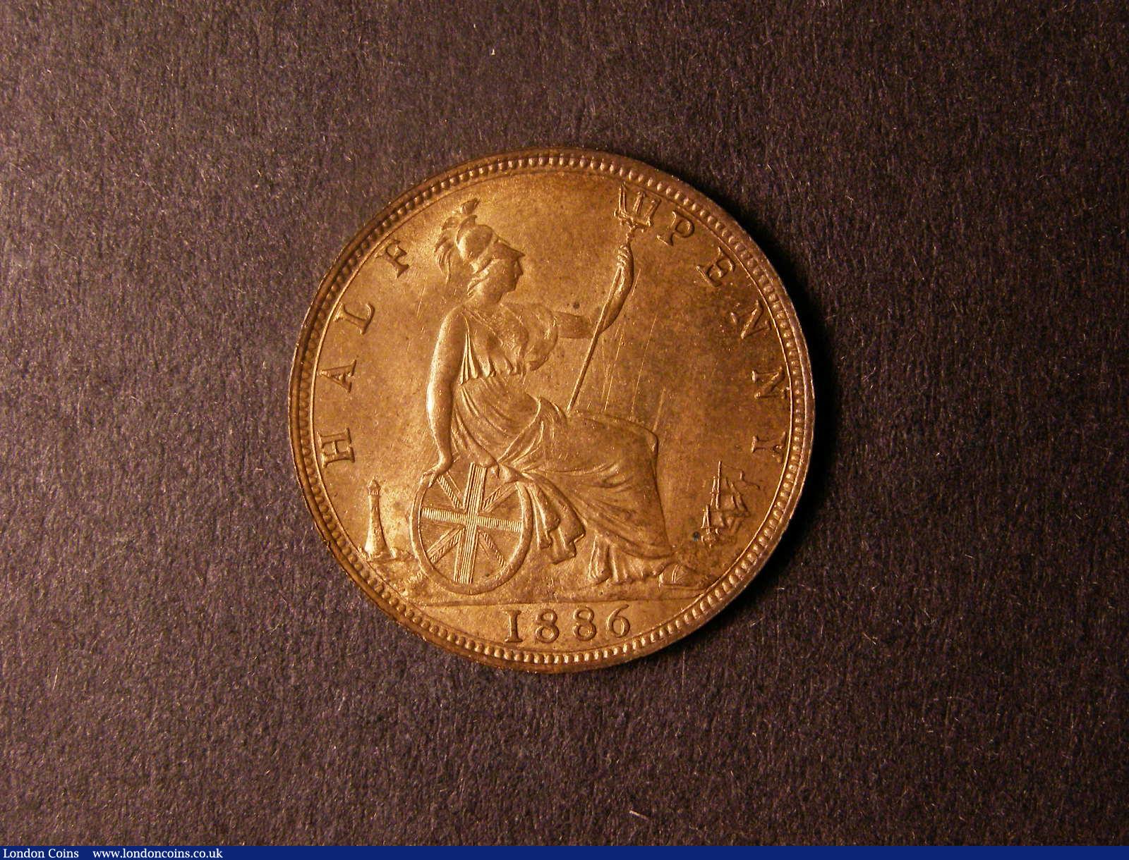 London Coins : A124 : Lot 2144 : Halfpenny 1886 Freeman 356 dies 17+S UNC the obverse with subdued lustre, the reverse with almos...