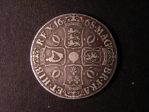 London Coins : A126 : Lot 878 : Crown 1668 ANNO. REGNI on edge, unaltered date ESC 36 Fine