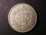 London Coins : A134 : Lot 1883 : Crown 1933 ESC 373 EF with a small dark spot in the wreath