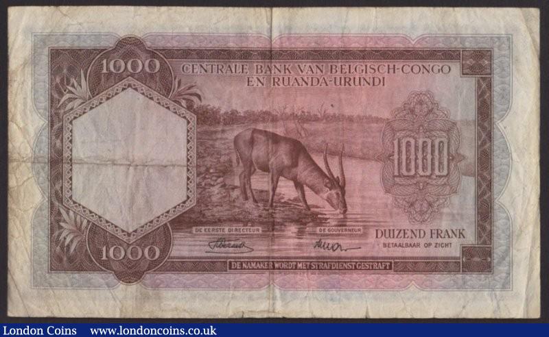 London Coins : A136 : Lot 587 : Belgian Congo 1000 francs, last date of issue 01.04.55 series A639614, 1cm tear at bottom le...