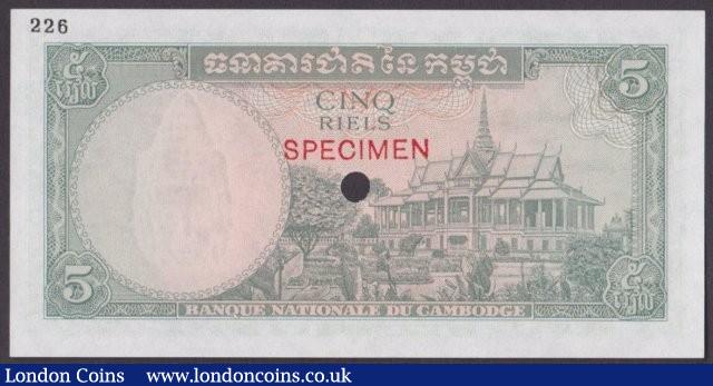 London Coins : A140 : Lot 439 : Cambodia 5 riels issued 1962, colour trial in green No.226, SPECIMEN ovpt. & 1 punch-hol...