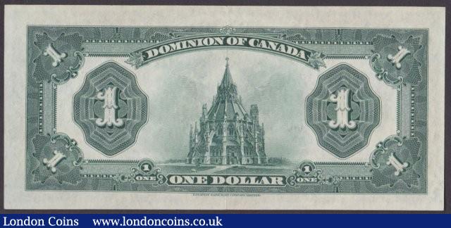 London Coins : A140 : Lot 461 : Canada, The Dominion of Canada $1 dated 1923 series B2582547, bronze seal at right, McCavour-Saunder...