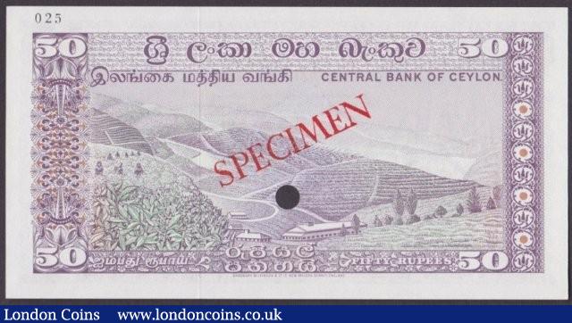 London Coins : A140 : Lot 494 : Ceylon 50 rupees issued 1972, Specimen No.025, SPECIMEN ovpt. & 1 punch-hole, Pick79...