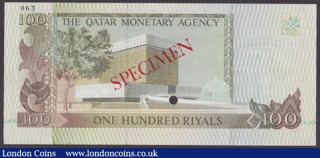 London Coins : A140 : Lot 646 : Qatar Monetary Agency 100 riyals issued 1980s, Specimen No.063, SPECIMEN ovpt. & 1 punch...