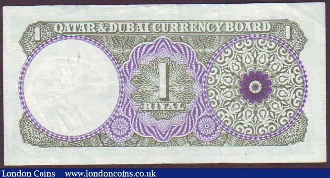 London Coins : A141 : Lot 324 : Qatar & Dubai 1 riyal issued 1960s series A/11 043314, Pick1a, inked numbers on watermar...
