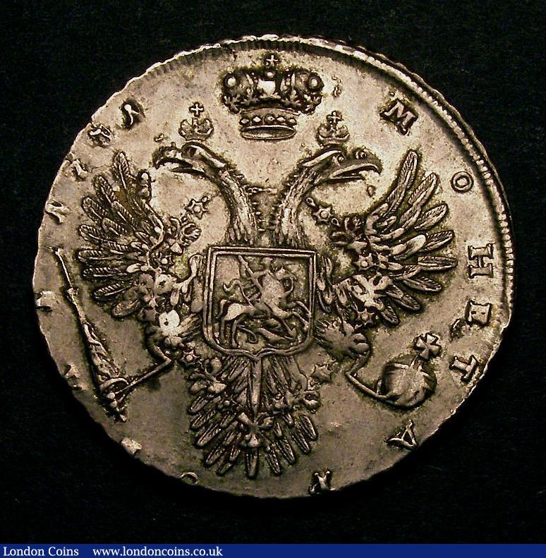 London Coins : A143 : Lot 1053 : Russia Rouble 1731 Anna KM#192.1 VF or better struck slightly off-centre, excellent portrait with a ...