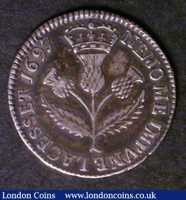 London Coins : A143 : Lot 1076 : Scotland 5 Shillings 1697 S.5688 with inverted die axis, Fine with grey tone the reverse slightly be...