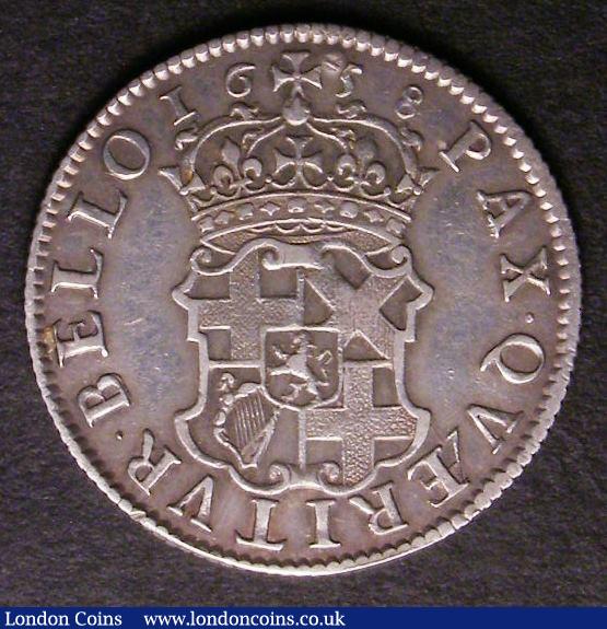 London Coins : A143 : Lot 2178 : Shilling 1658 Cromwell as ESC 1005 with swan countermark below the bust, with a slight flattening to...