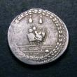 London Coins : A147 : Lot 1774 : Denarius Ar. Mn Fonteius C f.  C, 85 BC.  Obv; Laureate head of Apollo r.  Rev; Infant Genius seated...