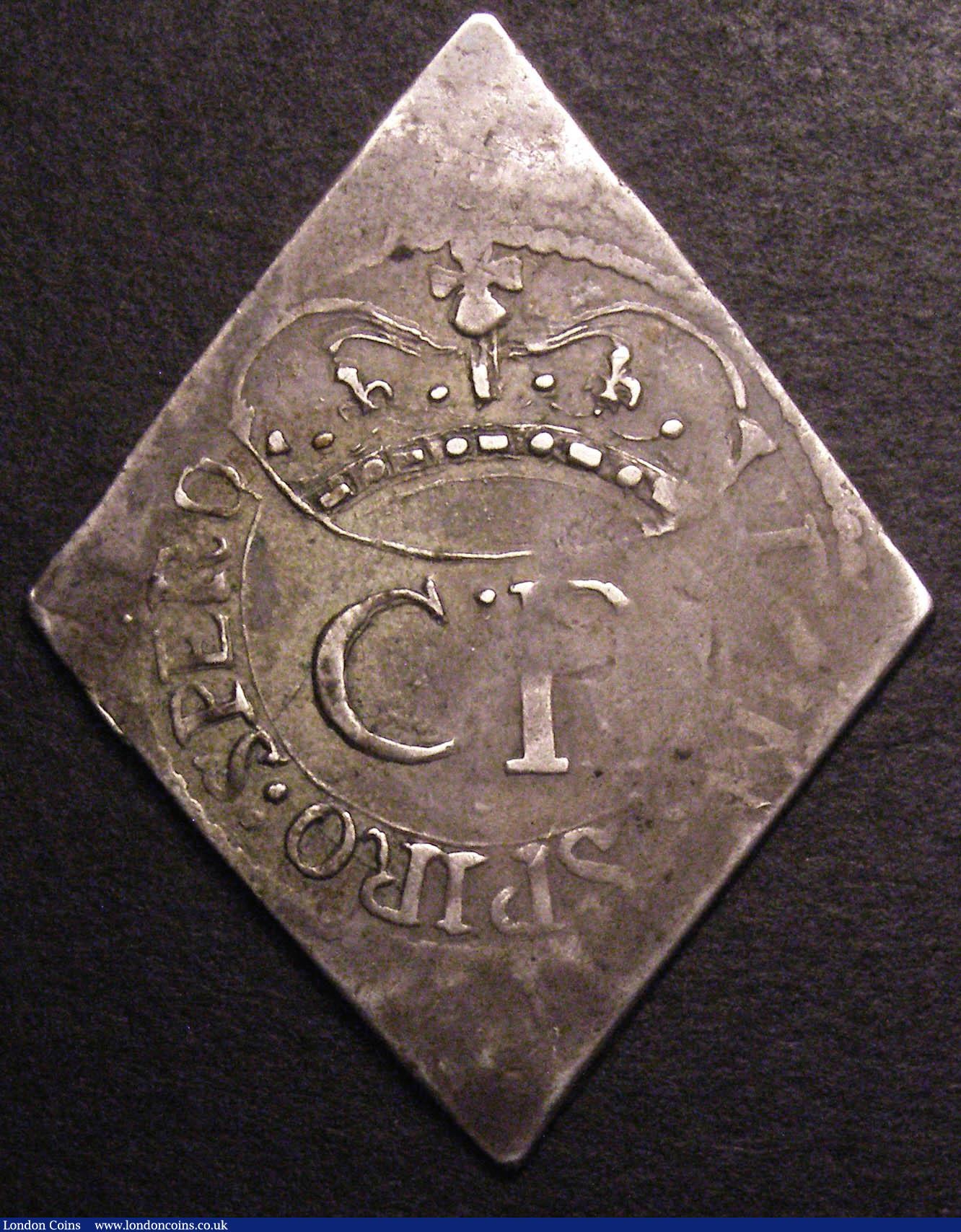 London Coins : A148 : Lot 1574 : Shilling Charles I 1648 Pontefract besieged, lozenge-shaped with XII to right of castle, dividing PC...