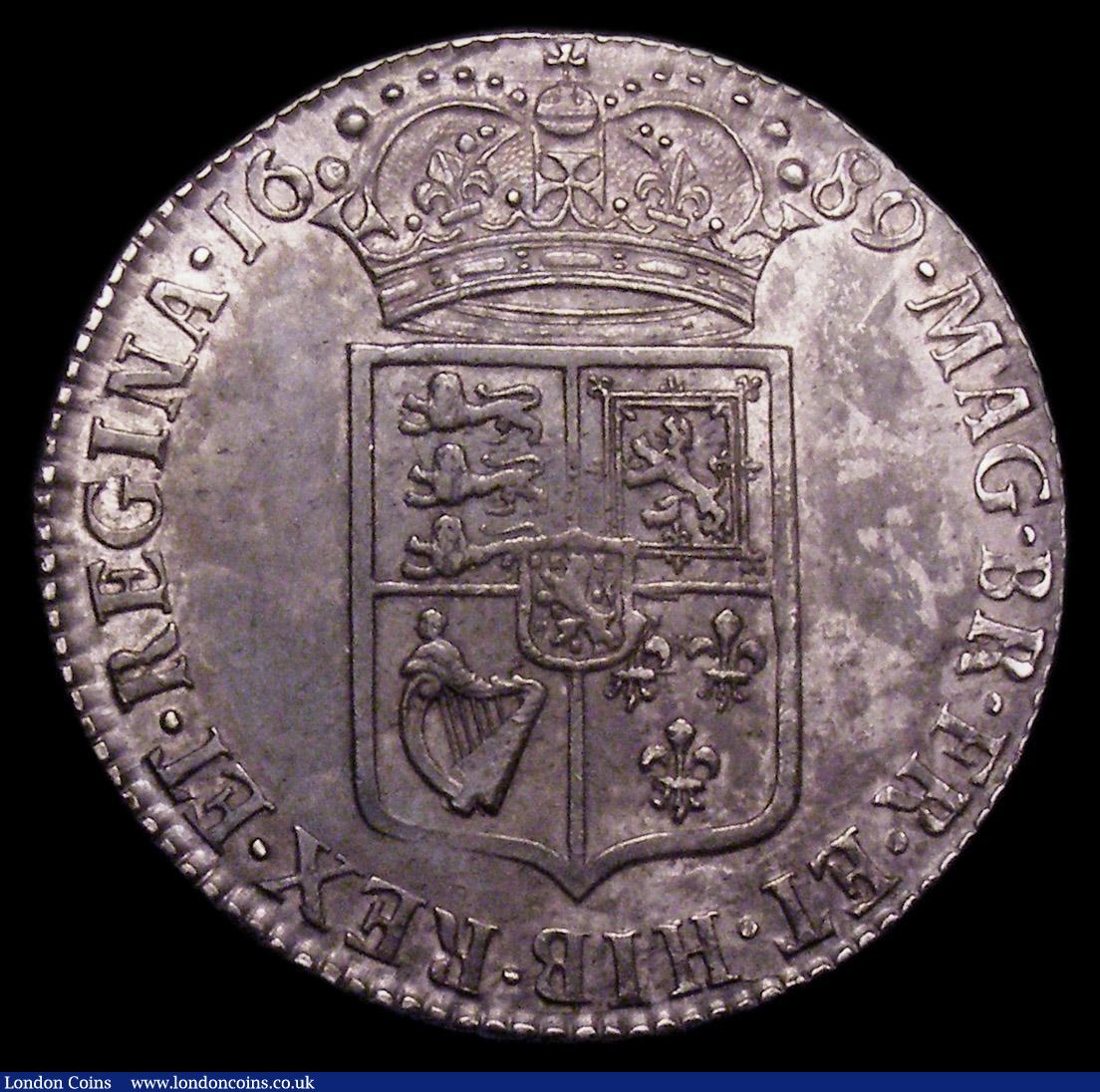London Coins : A150 : Lot 2289 : Halfcrown 1689 First Shield, Caul only frosted, with pearls ESC 505 GVF/NEF toned, the portraits wit...