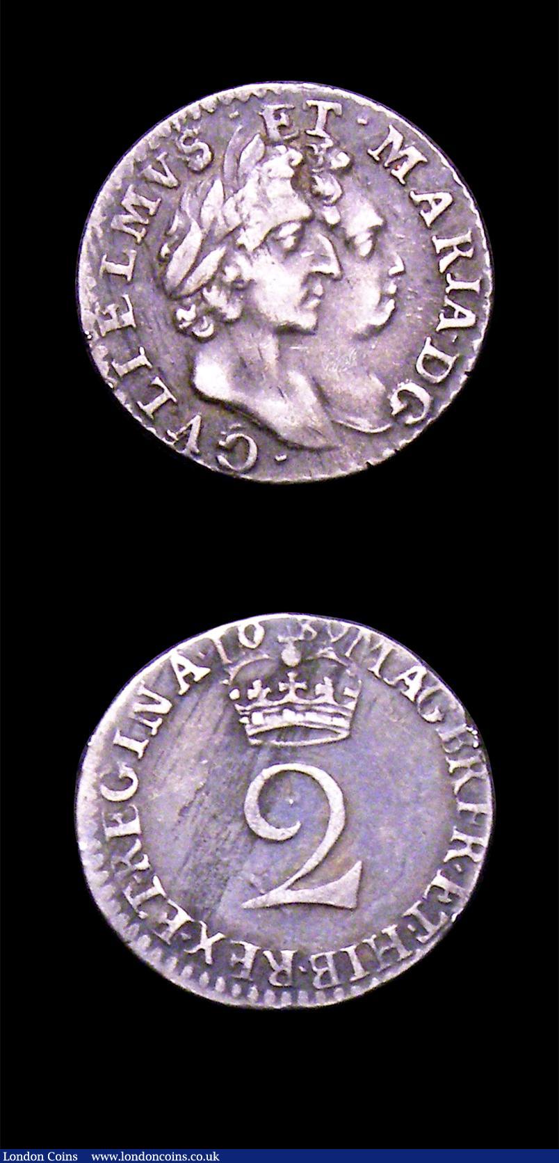London Coins : A153 : Lot 2249 : Maundy a 3-part set 1689 comprising Fourpence G below bust ESC 1866 NEF, Threepence ESC 1986 NVF, an...