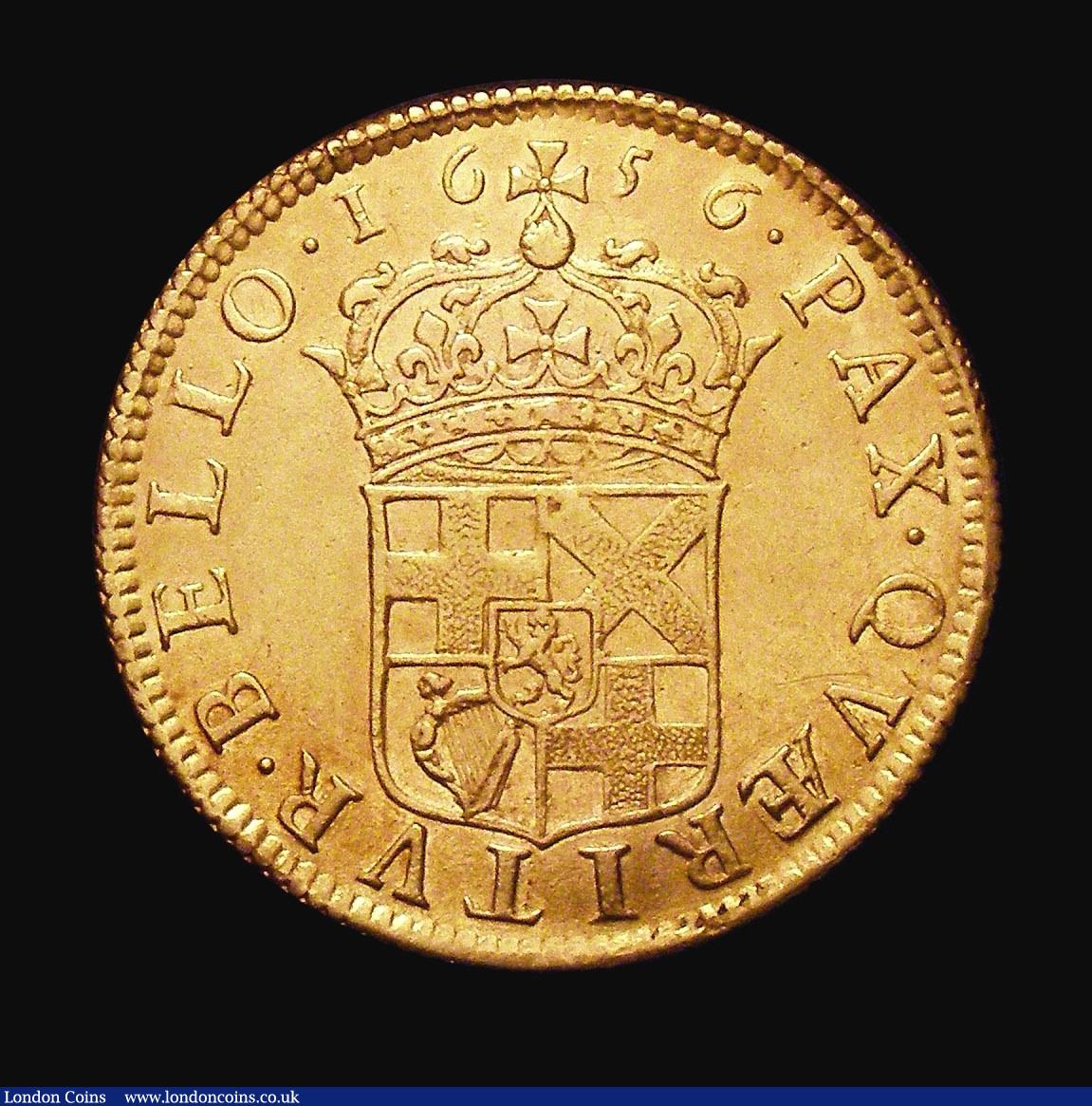 London Coins : A155 : Lot 682 : Broad 1656 Cromwell Milled edge, die axis inverted, S.3225 VF with some hairlines in the obverse fie...