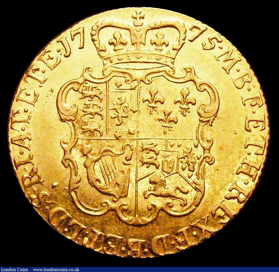 London Coins : A157 : Lot 2200 : Guinea 1775 S.3728 Near EF with some lustre the reverse with a small area of unevenness within the l...