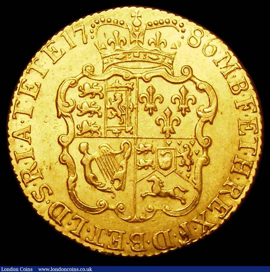 London Coins : A157 : Lot 2221 : Guinea 1786 S.3728 GVF and lustrous, the obverse with some light scratches