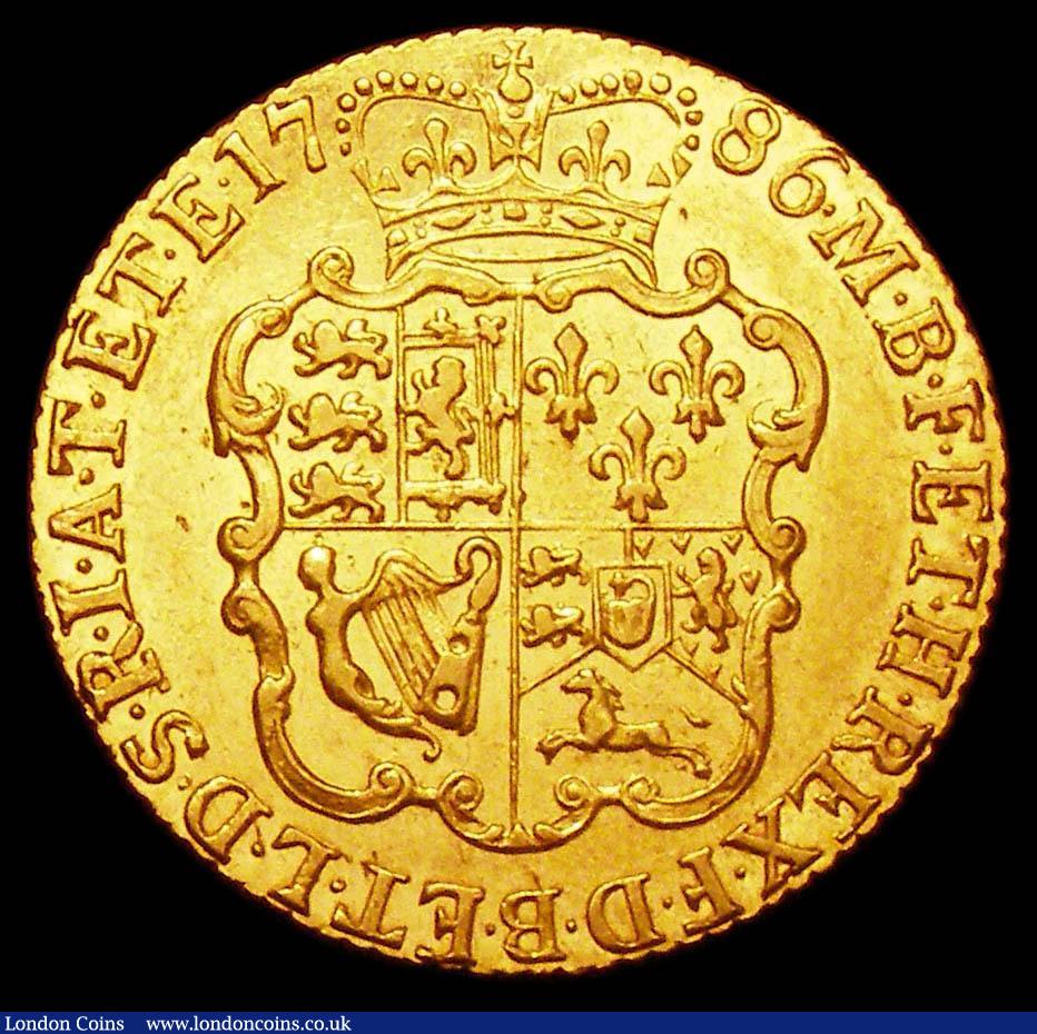 London Coins : A157 : Lot 2222 : Guinea 1786 S.3728 GVF/VF and lustrous, the obverse with some minor contact marks