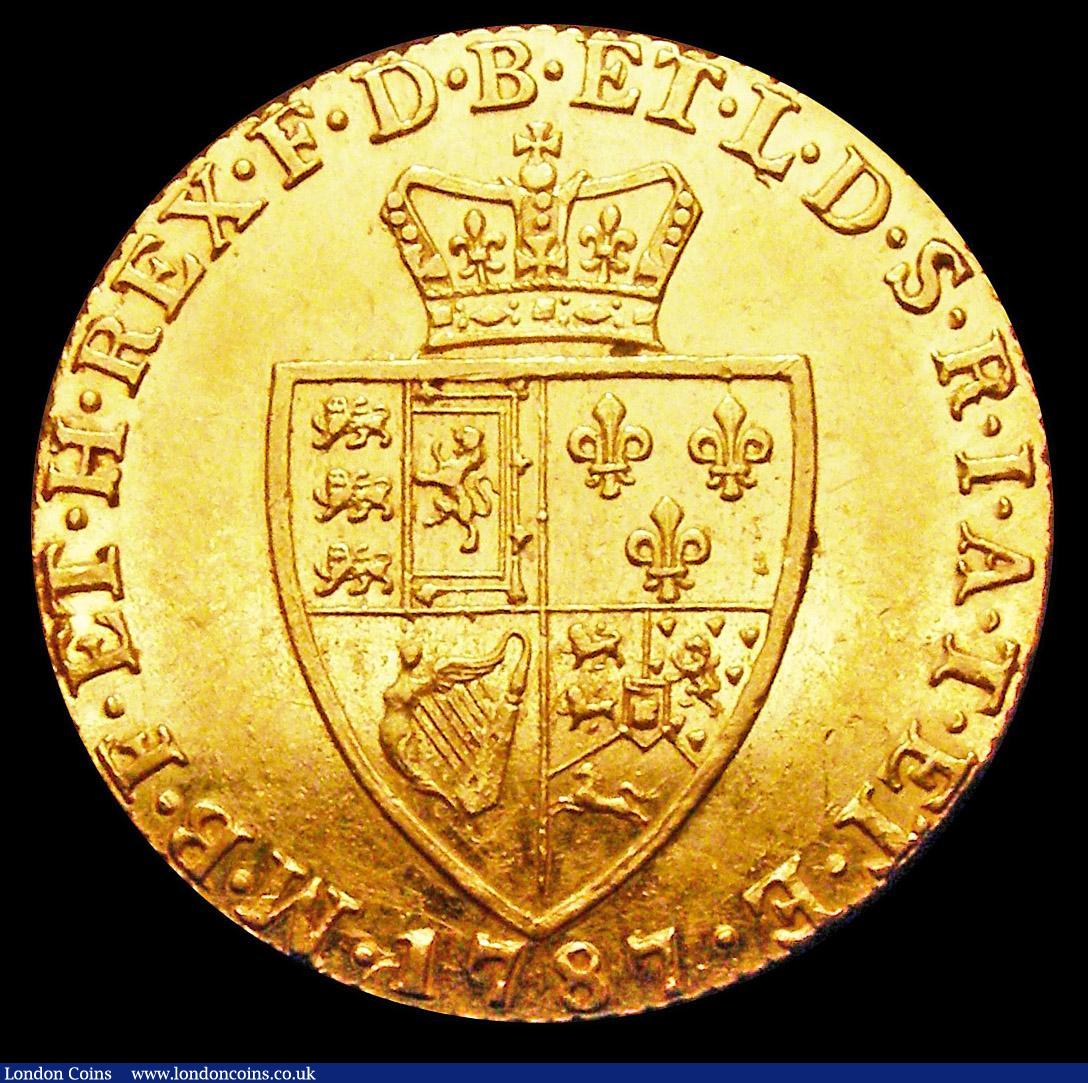 London Coins : A157 : Lot 2227 : Guinea 1787 as S.3729 the central line to the shield extends beyond the lower point of the shield to...
