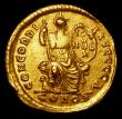 London Coins : A157 : Lot 1827 : Theodosius I.  Au solidus.  C, 383-388 AD.  Constantinople.  Rev; CONCORDIA AVGGGA;  Constantnopolis...