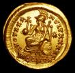London Coins : A157 : Lot 1828 : Theodosius II.  Au solidus.  C, 430-440 AD.  Rev;  VOT XXX MVLT XXXX Γ; Constantinopolis enthr...