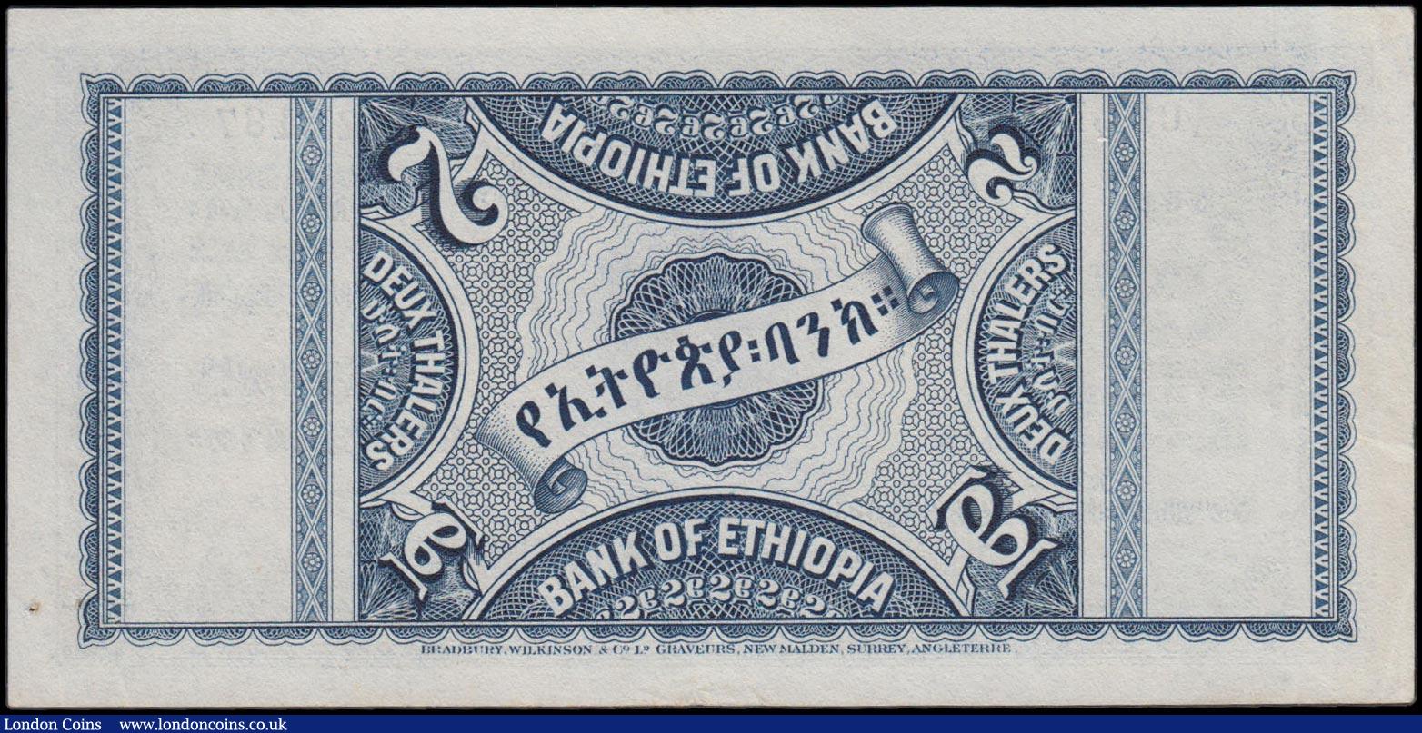 London Coins : A159 : Lot 1673 : Ethiopia 2 Thalers dated 1st June 1933 series F/1 021187, Haile Selassie and wife at centre, (Pick6)...