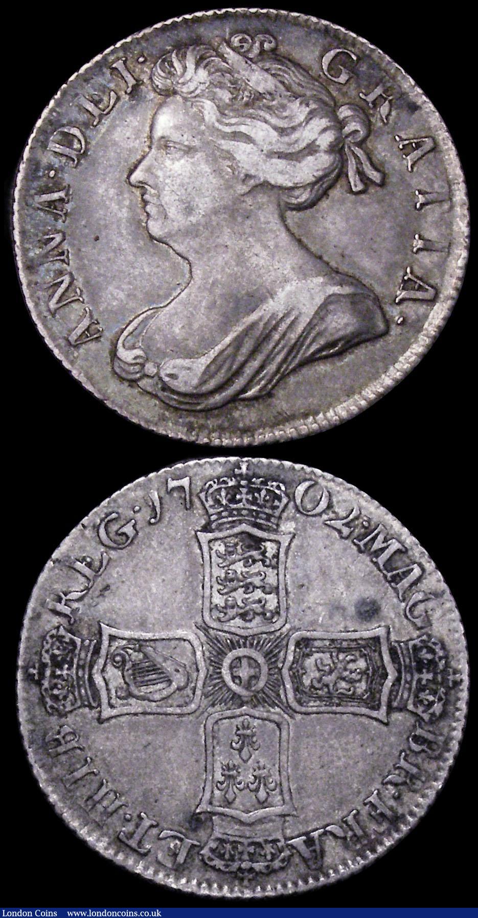 London Coins : A160 : Lot 2514 : Shillings (2) 1702 First Bust ESC 1128 Fine/Good Fine the reverse with a tone spot, 1708 E* ESC 1145...