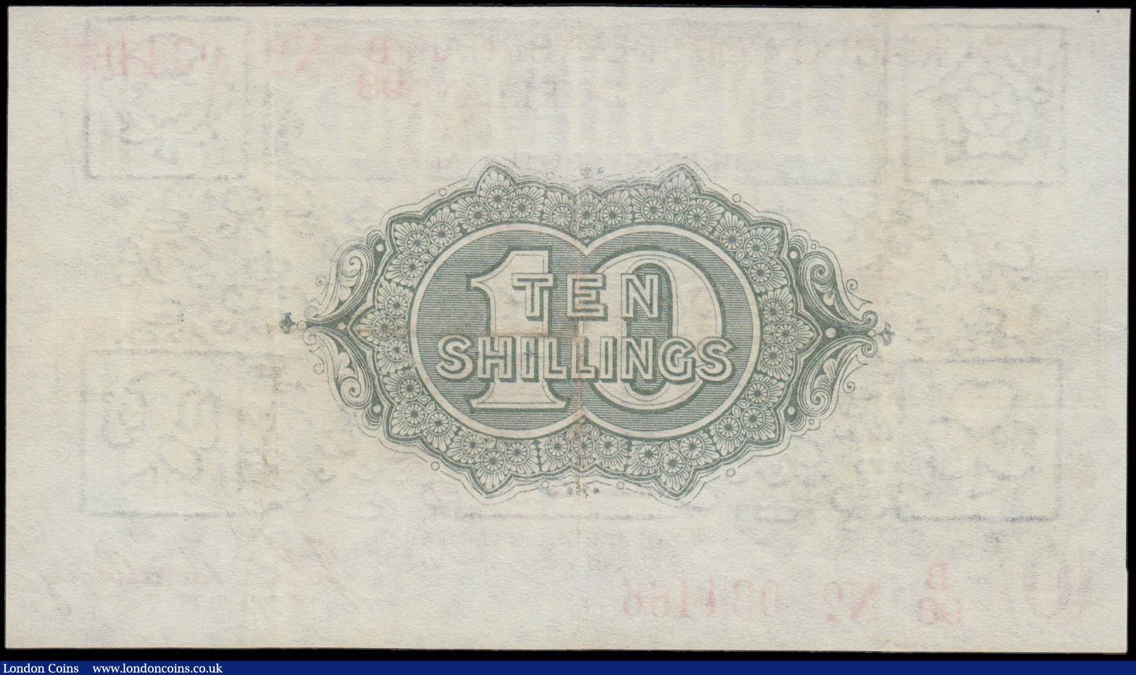 London Coins : A165 : Lot 509 : Ten Shillings Bradbury T20 Red Dash in No. Third issue 1918 series B98 034466 pressed VF-GVF
