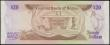 London Coins : A165 : Lot 1163 : Belize Central Bank 20 Dollars Pick 45 dated 1st July 1983 serial number T/4 403778, brown and red-o...
