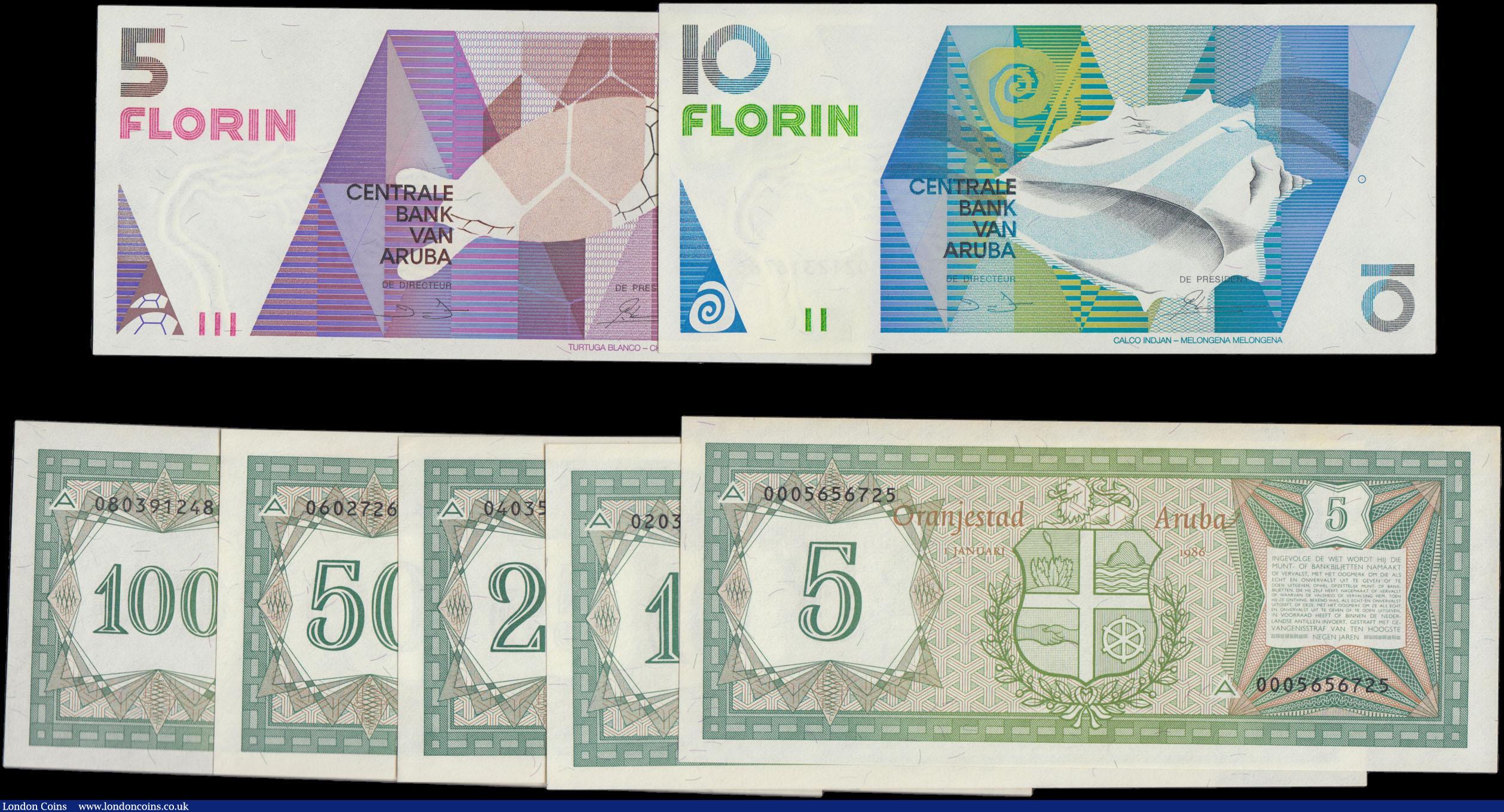 London Coins : A166 : Lot 101 : Aruba (7) including a complete denomination set of the Banco Central di Aruba 1986 "Flag" ...