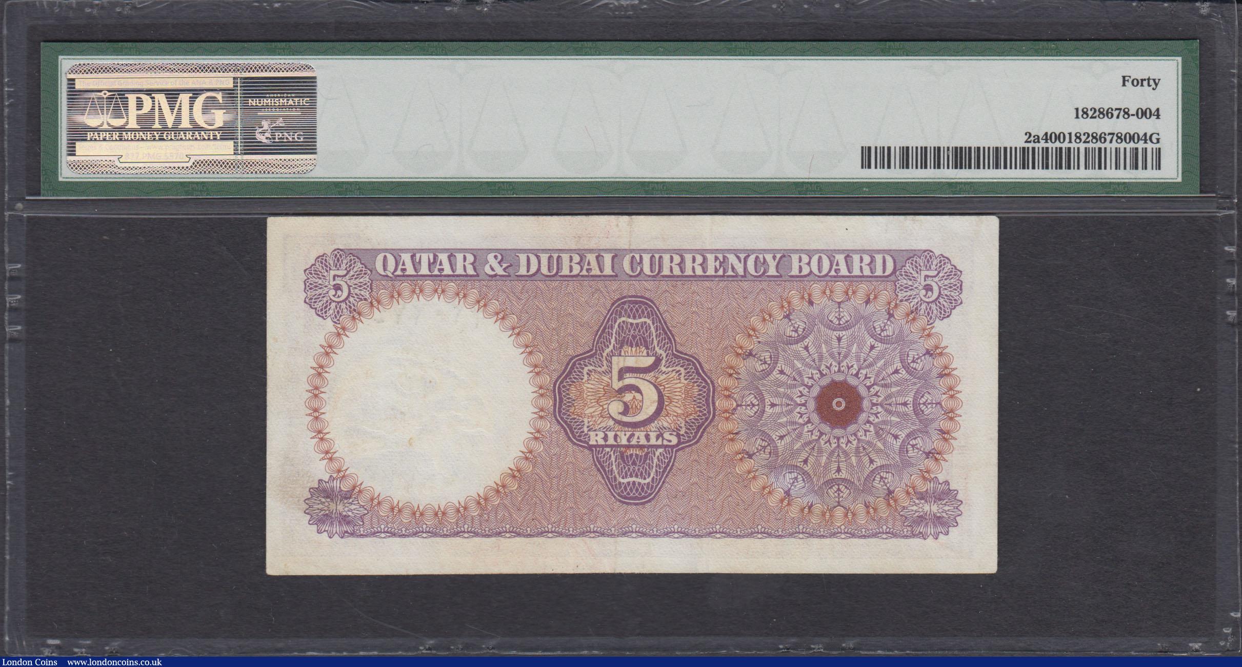 London Coins : A166 : Lot 381 : Qatar & Dubai Currency Board 5 Riyals Pick 2a ND (circa 1960's) serial number A/6 202747. T...
