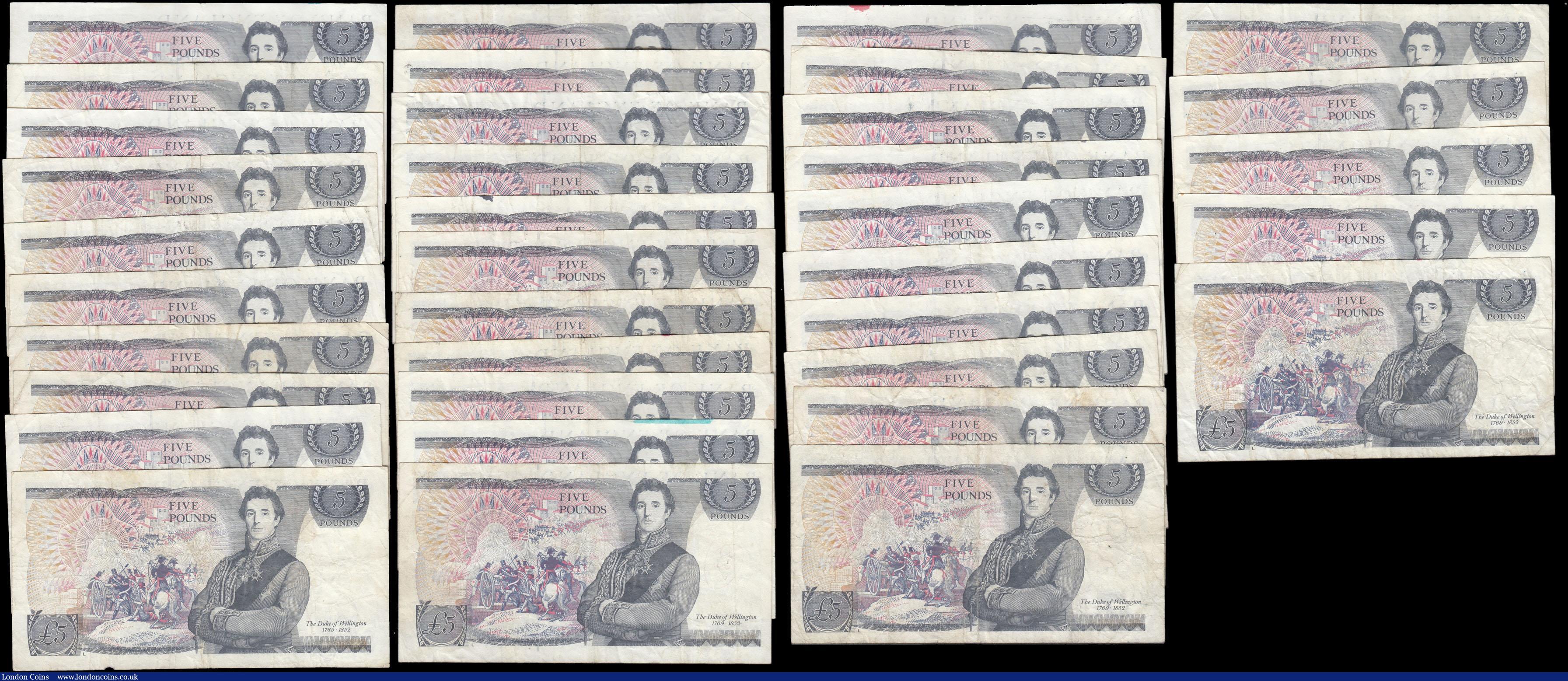 London Coins : A166 : Lot 75 : Five Pounds Gill QE2 pictorial & The Duke of Wellington B353 L Reverse issues 1988 (36) in mixed...