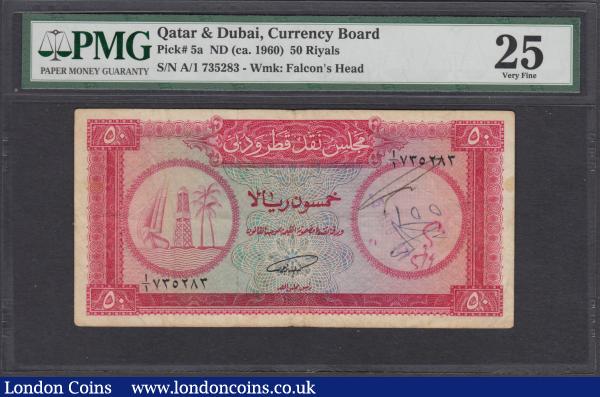 Qatar & Dubai Currency Board 50 Riyals Pick 5a ND (circa 1960's) serial number A/1 735283. The note in red on multicoloured underprint Dhow, derrick, and palm tree at left on obverse and denomination at centre on a guilloche panel and issuer across the top on reverse, watermarked Falcon's head and bearing the signature Khalifa bin Hamad al-Thani. In a PMG holder and graded Very Fine 25 Annotations. One of the rarest denominations for the short-lived currency union of Qatar & Dubai being perceived to be just as Rare as the 25 Riyals, this note will make a fascinating addition to any serious collection. While the use of 1, 5, 10 and 100 Riyals proved popular and numbers increased in circulation over the years after the initial release, the 25 and 50 Riyals however decreased and with the initial issued figures being significantly lower than the other denominations not a lot of examples must have survived over the years. : World Banknotes : Auction 167 : Lot 1585