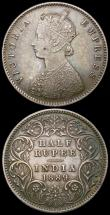 London Coins : A168 : Lot 2023 : India Half Rupees (3) 1840 Legend divided, WW incuse on truncation KM#456.1 Fine, toned, 1889 Calcut...