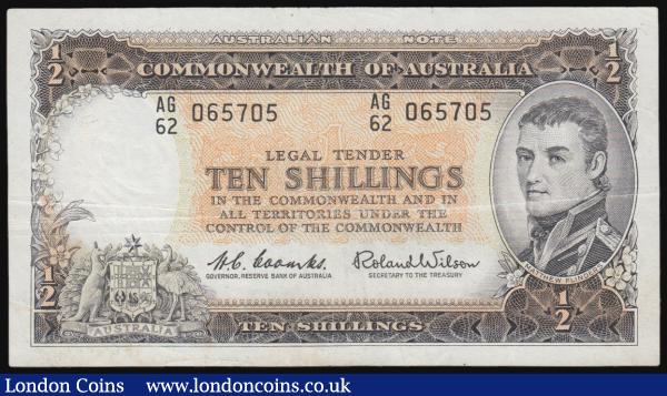 Australia Reserve Bank 10 Shillings Pick 33a (McD 25, Rks. 17) ND 1961-65 signatures Coombs & Wilson serial number AG/62 065705, presentable good Fine. The note in dark brown on orange and green underprint featuring Mathew Flinders portrait and Australia's Coat of Arms on obverse. The reverse illustrating the Parliament house, Canberra. Watermarked James Cook and denomination in wording ("HALF") twice at lower centre. : World Banknotes : Auction 171 : Lot 84
