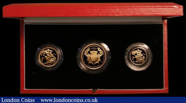 The 1986 United Kingdom Gold Proof Set, Three-coin Set comprising Two Pounds Commonwealth Games, Sovereign and Half Sovereign nFDC to FDC the Half Sovereign with some light toning, in the Royal Mint box of issue with certificate : English Cased : Auction 175 : Lot 548
