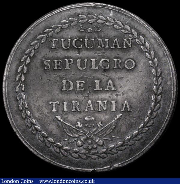 Argentina Battle of Tucuman 1812 General Manuel Belgrano 48mm diameter, weight 48.91 grammes, Rosa 93. Struck in Potosi, Bolivia, Obverse: BAIO LA PROTECCION DE NUESTRA SENORA DE MERCEDES GENERALADEL EXERCITO with VICTORIA DEL 24 DE SEPTEMBRE within a wreath, Reverse: TUCUMAN SEPULCRO DE LA TIRANIA within a wreath, Edge reads ***VIVA LA RELIGION LA PATRIA Y LA UNION***. Good Fine. Cataloguer's note General Manuel Belgrano was a founding figure in the Wars of Argentinian Independence. At the battle of Tucuman, General Belgrano led the Army of the North, and defeated the Royalist Troops, led by General Pio de Tristan, who had a two-to-one advantage in numbers, thus halting the royalist advance on the North West of Argentina. This together with the Battle of Salta on 20 February 1813 allowed the Argentine troops to reaffirm the borders under their control. The cruiser ARA General Belgrano which was sunk during the Falklands War 1982 was named after him as was the earlier 1896 ARA General Belgrano, as well as Puerto Belgrano, the largest base of the Argentinian Navy. Many other small towns and departments also bear his name. These facts alone link the medal indirectly to many different historical events : Medals : Auction 175 : Lot 785