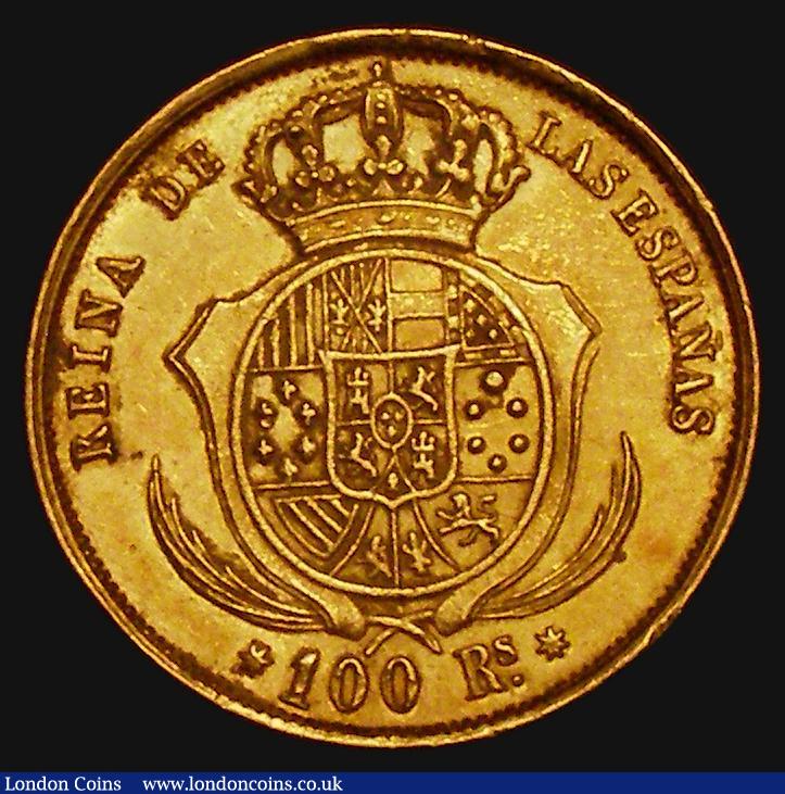 London Coins : A176 : Lot 1040 : Spain 100 Reales Gold 1858 Seville Mint - Mintmark 7-pointed star KM#605.3 NEF with a few minor hair...