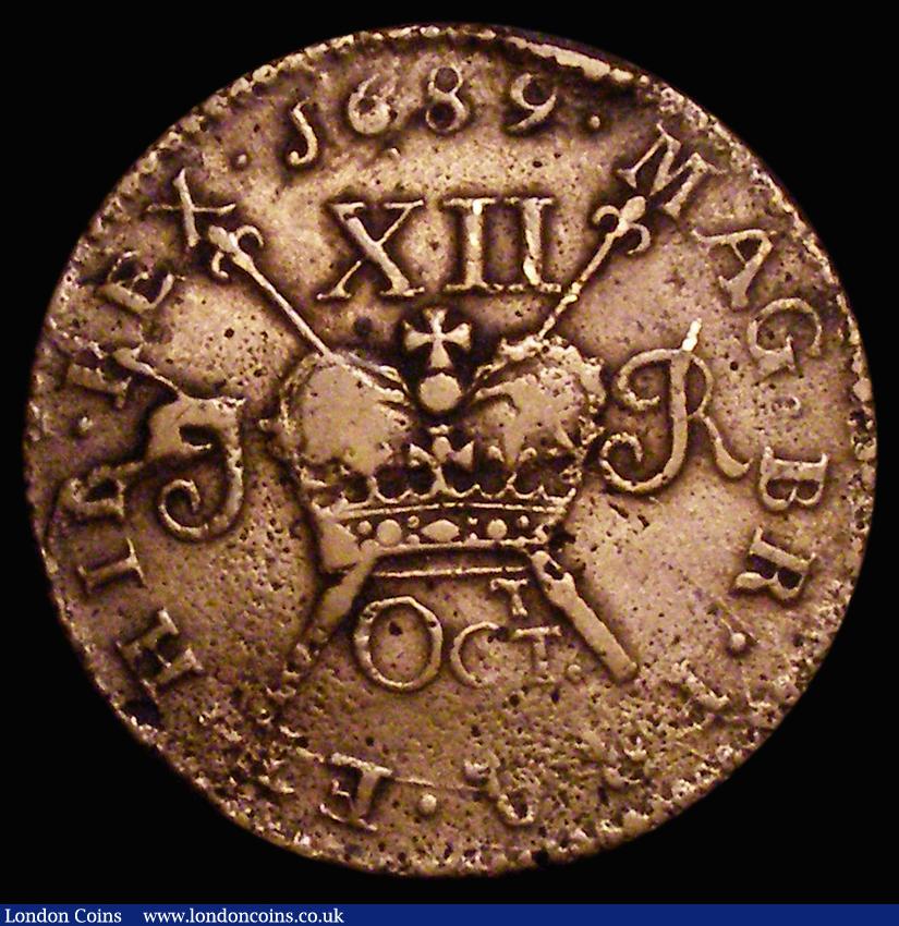 London Coins : A176 : Lot 961 : Ireland Shilling Gunmoney 1689 Octr. S.6581E, Timmins TB12E-1C, Good Fine/Fine, the obverse with som...