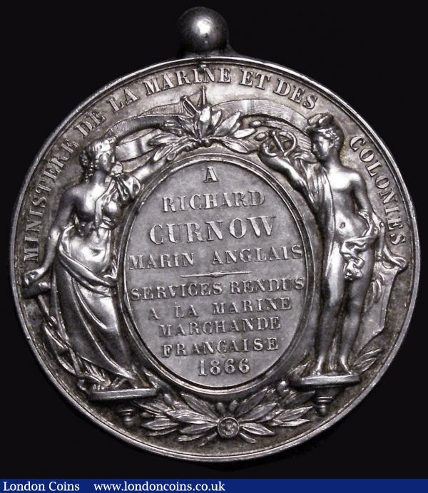 France - Life-saving award Obverse: Bust of Napoleon III to right, NAPOLEON III EMPEREUR, Reverse: An Oval shield with inscription with supporters a female figure to left, holding a laurel branch, and Mercury to right with caduceus, each upon a pedestal decorated with an olive branch MINSTERE DE LA MARINE ET DES COLONIES. Upon the shield, the name of the recipient A RICHARD CURNOW MARIN ANGLAIS SERVICES RENDUS A LA MARINE MARCHANDE FRANCAISE 1866, EF with suspension ball on the top, an impressive piece  : Medals : Auction 176 : Lot 752