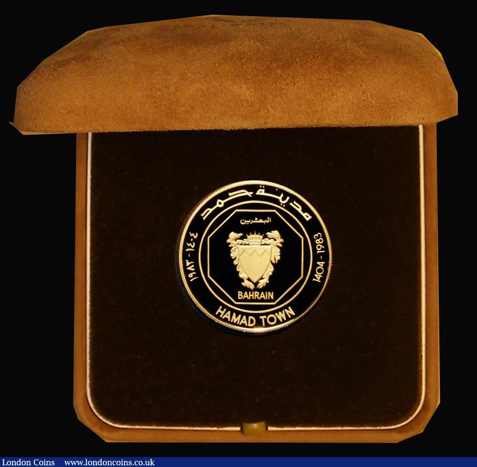 London Coins : A177 : Lot 641 : Bahrain Ten Dinars 1983 Hamad Town 1404-1983 Gold Proof FDC, weight 16.00 grammes, listed in Krause ...