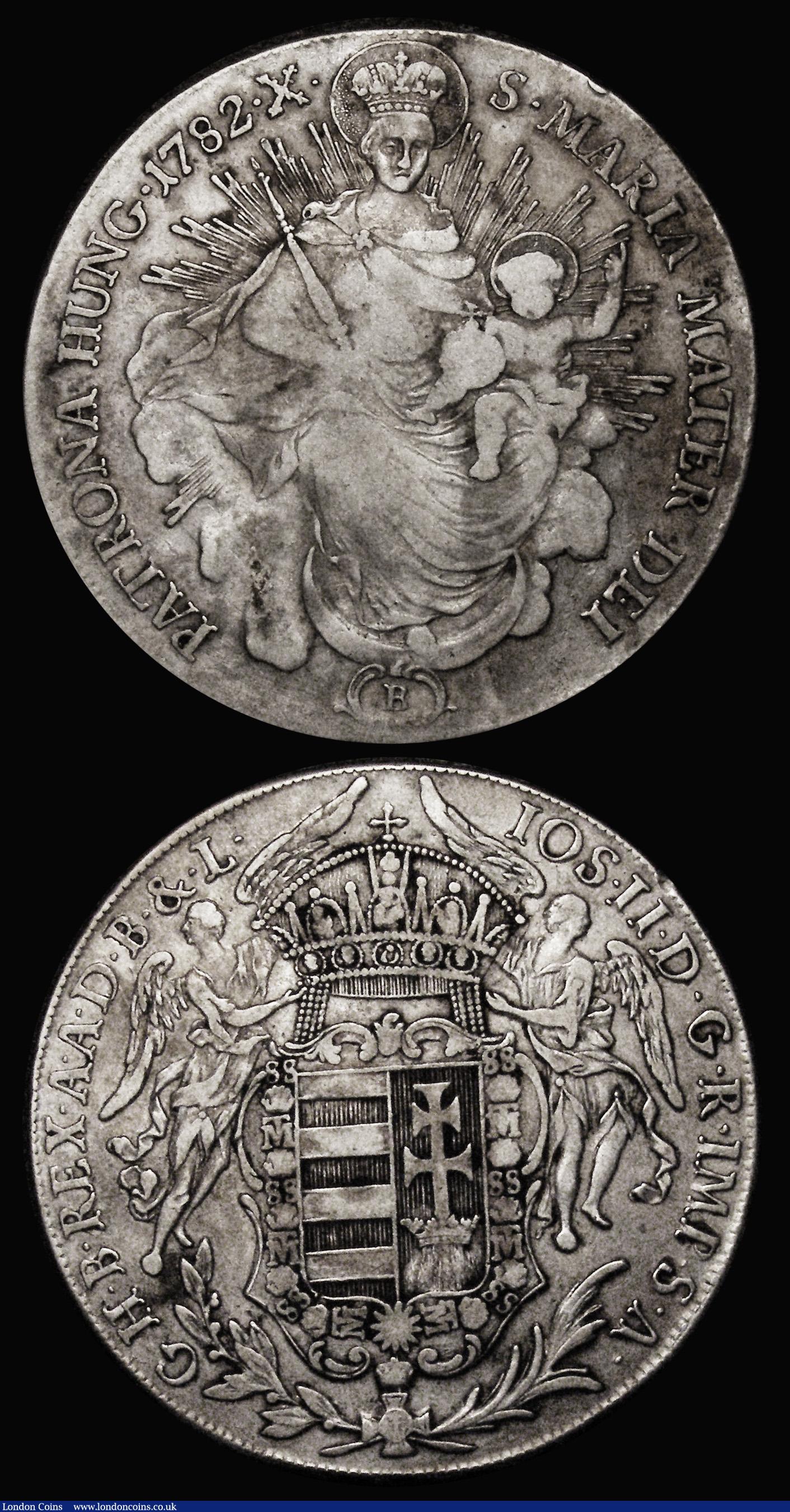 London Coins : A179 : Lot 1119 : Hungary Thalers (2) 1780 BX Crowned arms obverse, Madonna with Child reverse KM#395.1 GF/NVF with a ...