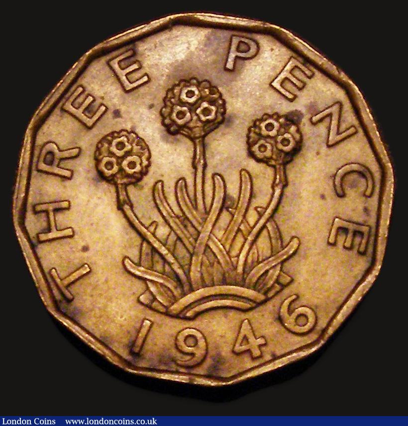 London Coins : A180 : Lot 1221 : Brass Threepence 1946 Peck 2388 NEF with some dark tone spots, Rare