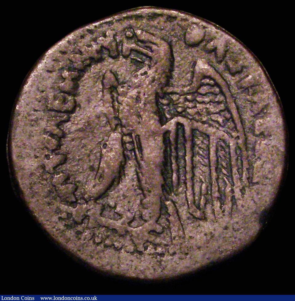 London Coins : A181 : Lot 1267 : Ptolemaic Kingdom of Egypt, Ae26, Ptolemy IV (222-204BC) Obverse: head of Cleopatra as Isis right, w...