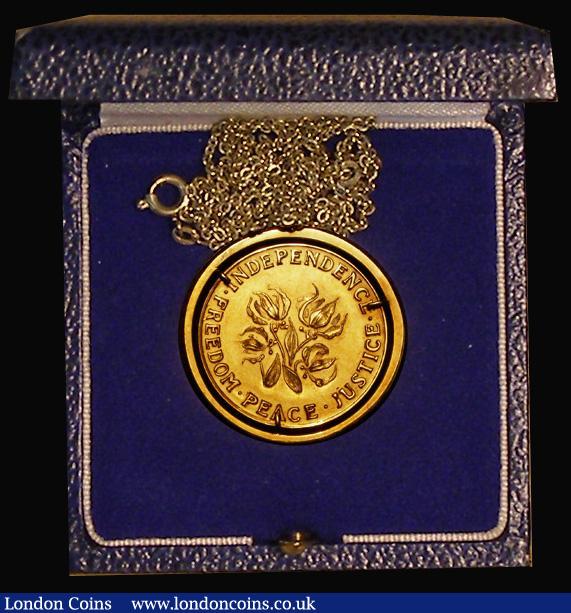 London Coins : A181 : Lot 839 : Rhodesia Independence 1965 25mm diameter in 18 carat gold, Obverse: Ian Smith portrait left RHODESIA...