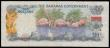 London Coins : A182 : Lot 116 : Bahamas Government 10 Dollars issued 1965 first prefix series A452908, Pick22a, portrait QEII at lef...