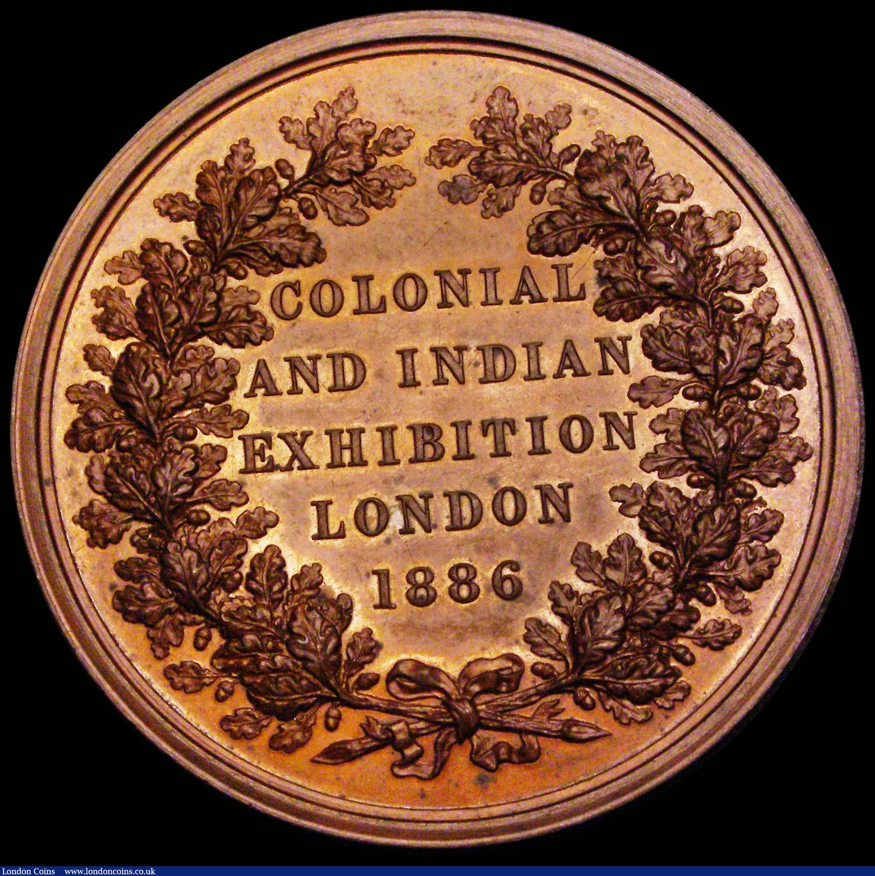 London Coins : A185 : Lot 1220 : Colonial and Indian Exhibition, London 1886, 52mm diameter in bronze by L.C. Wyon, manufactured by R...