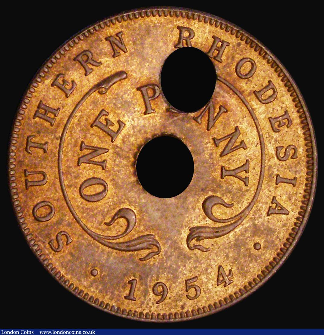 London Coins : A186 : Lot 1182 : Southern Rhodesia Penny 1954 with two holes, one slightly oval, KM#29 A/UNC with traces of lustre