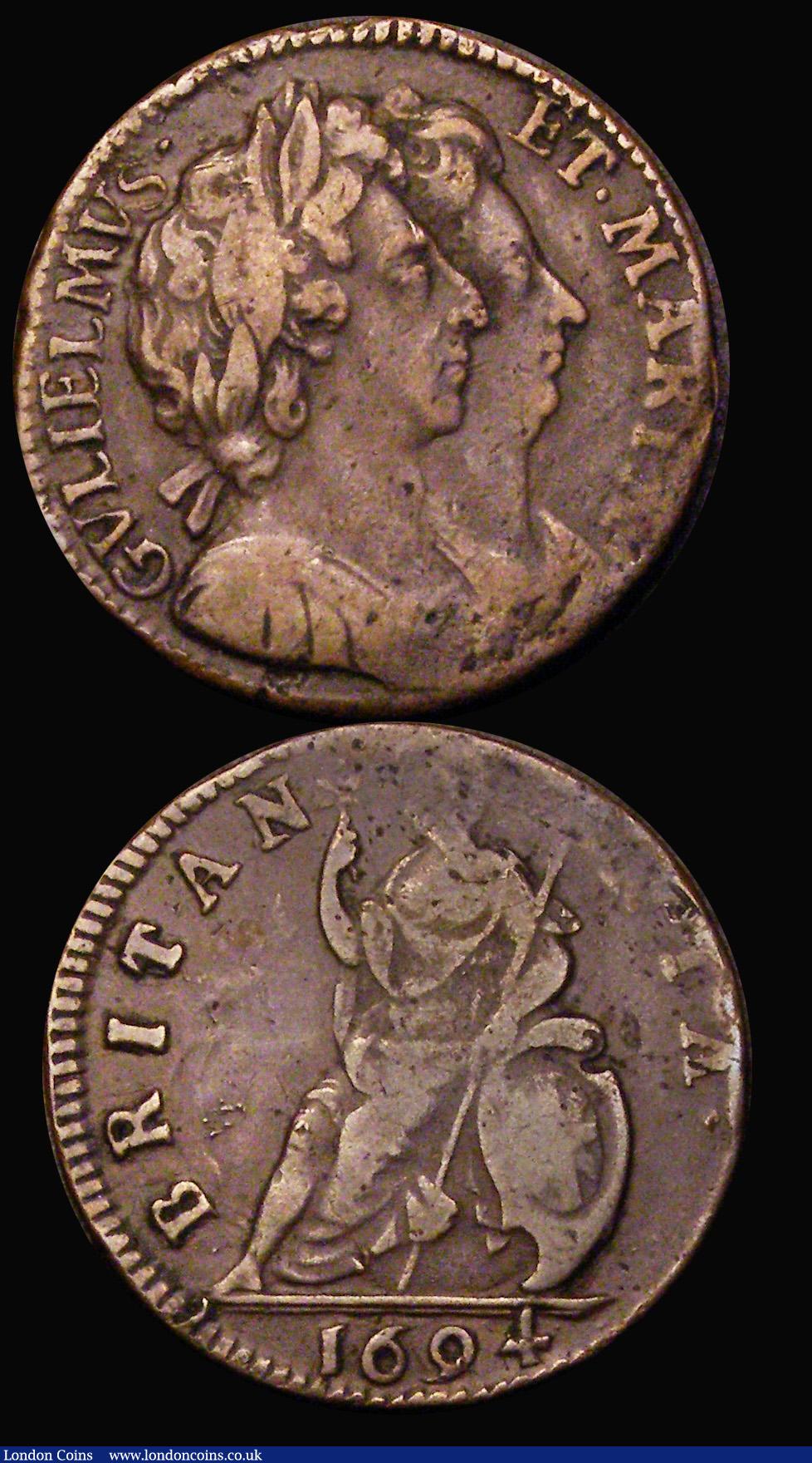 London Coins : A186 : Lot 1486 : Farthing 1694 Peck 616 Fine, weak at the top of the reverse as often, Halfpenny 1673 Fine on a pitte...