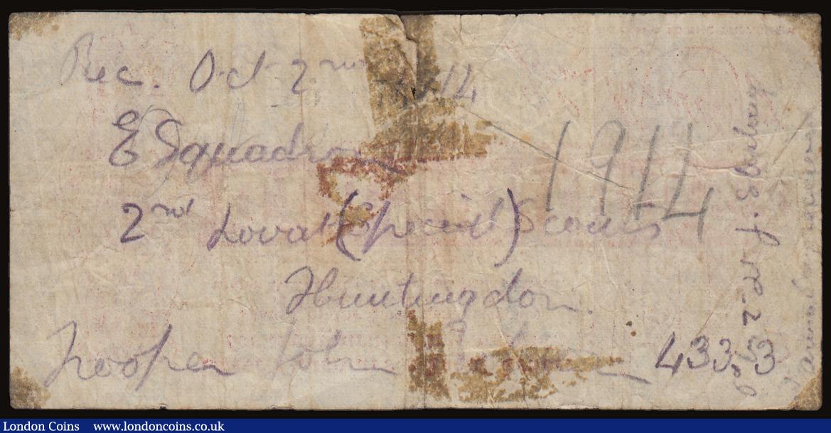 London Coins : A186 : Lot 5 : Ten Shillings Bradbury T8, T/17 012847 VG with signs of mounting on the corners, two central staple ...